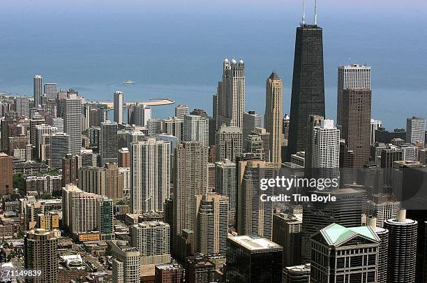 The John Hancock building dominates the Chicago skyline with Lake Michigan in the background as seen from the Sears Tower Skydeck observation deck...