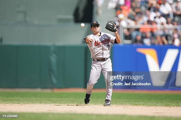 Infielder Chris Burke of the Houston Astros makes a throw against the San Francisco Giants at AT&T Park on April 13, 2006 in San Francisco,...