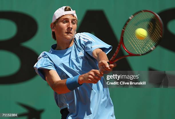 Thiemo De Bakker of the Netherlands in action against Andrei Martin of Slovakia during the junior boys match on day twelve of the French Open at...
