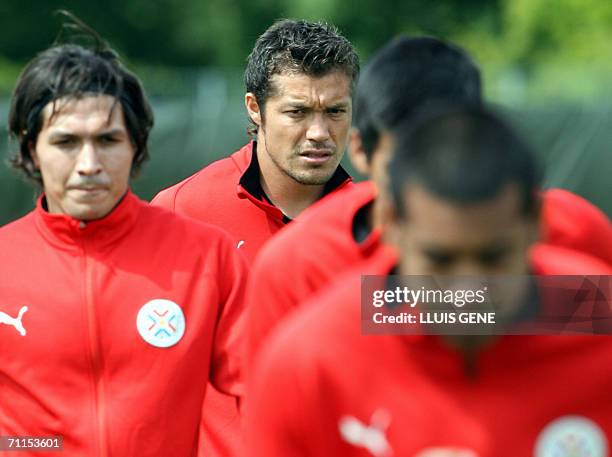 Paraguayan forward Dante Lopez who was incorporated today in substitution of injured Jose Cardoso, stretches during a training session, 08 June 2006...