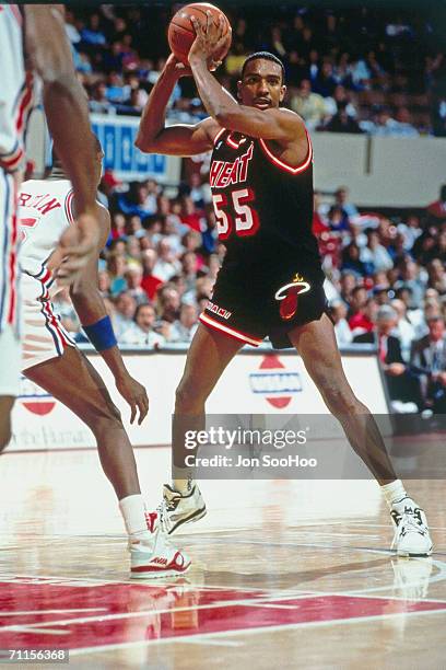 Billy Thompson of the Miami heat looks for the open man against the Los Angeles Clippers at the Los Angeles Memorial Sports Arena in Los Angeles,...