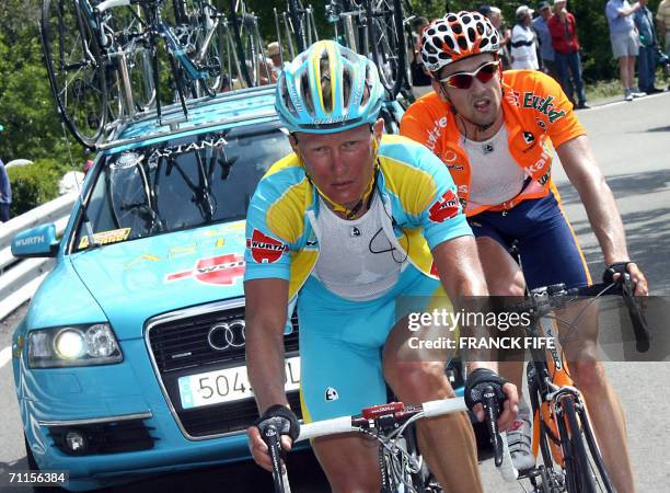 Beaumont-du-Ventoux, FRANCE: Kazak Alexandre Vinokourov , one of the main contenders for the next Tour de France, rides during the fourth stage of...