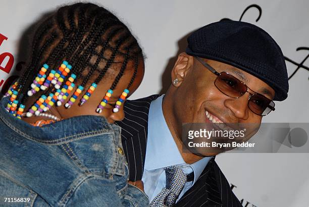 Rapper LL Cool J and his daughter Nina Smith attend the 65th Annual Father of the Year Awards on June 8, 2006 in New York City.