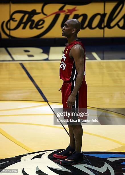 Miami Heat guard Gary Payton walks off the court after the Heat beat the New Jersey Nets, 102-92, in Game 4 of second round NBA playoffs basketball Sunday, May 14, 2006 in East Rutherford, N.J. Payton scored one basket in the game, a three-point shot