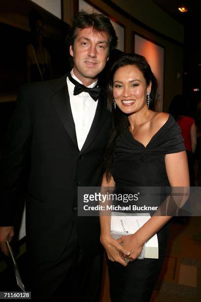 Actress Tia Carrere and husband photographer Simon Wakelin attend the cocktail party for the 34th AFI Life Achievement Award tribute to Sir Sean...