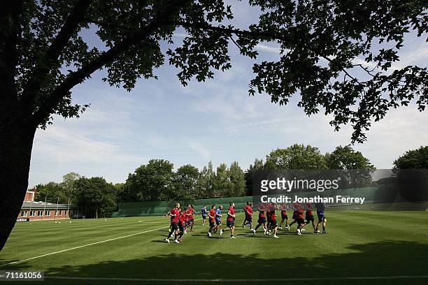 Players warm up by jogging during a training session for the United States National Team at on June 9th, 2006 at HSV training center in Norderstedt,...