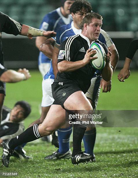 Campbell Johnstone of the Junior All Blacks runs with the ball during the Pacific 5 Nations game between the Junior All Blacks and Samoa at North...