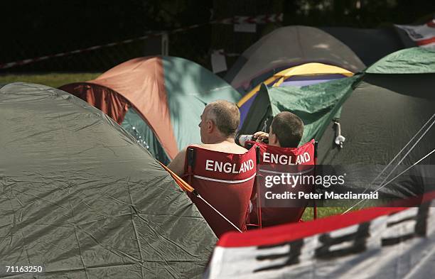 Two England football supporters relax at a city centre camp site on June 9, 2006 in Frankfurt, Germany. Hosts Germany will play Costa Rica in the...