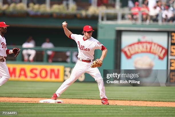 Chase Utley of the Philadelphia Phillies throwing during the game against the Washington Nationals at Citizens Bank Park in Philadelphia,...