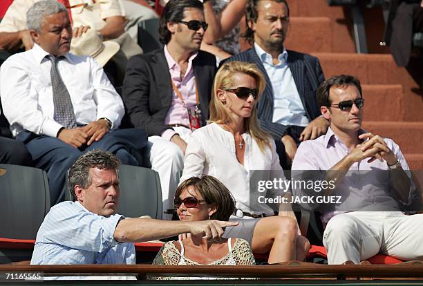 The brother of US President George W. Bush, Marvin Bush , is seen in the stands with former French tennis player Henri Leconte during the match...