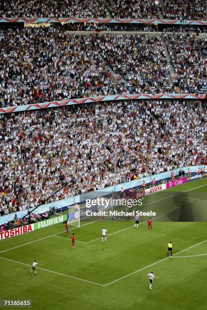 German fans celebrate as Miroslav Klose of Germany scores his teams third goal during the FIFA World Cup Germany 2006 Group A match between Germany...