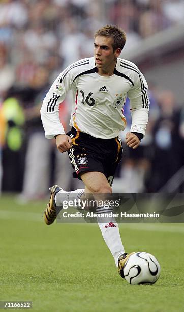 Philipp Lahm of Germany runs with the ball during the FIFA World Cup Germany 2006 Group A match between Germany and Costa Rica at the Stadium Munich...