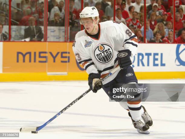 Ales Hemsky of the Edmonton Oilers skates with the puck against the Carolina Hurricanes during game two of the 2006 NHL Stanley Cup Finals on June 7,...