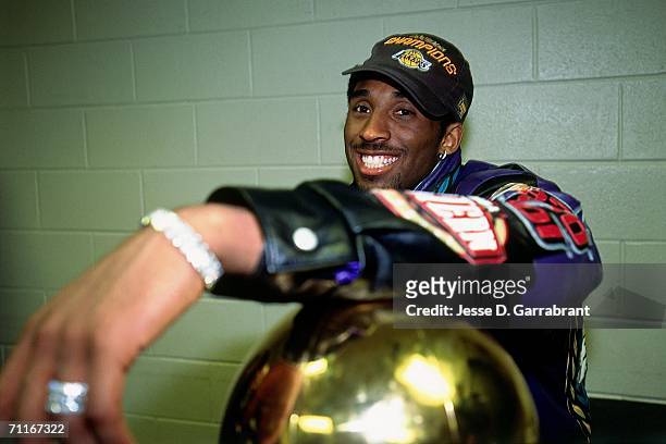 Kobe Bryant of the Los Angeles Lakers flashes a big smile after winning the NBA Championship by defeating the Philadelphia 76ers during game five of...