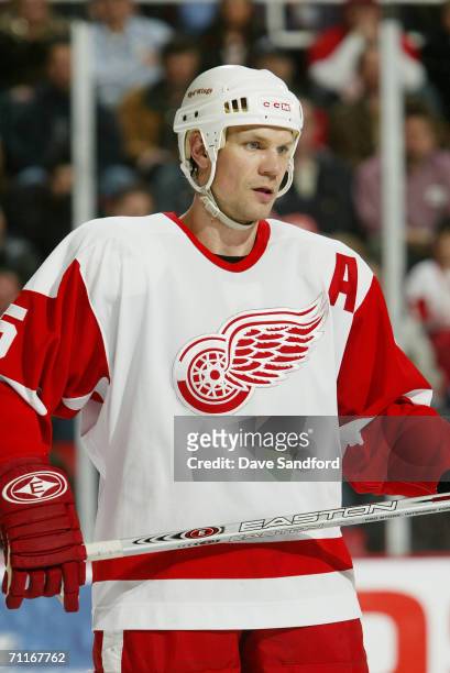 Nicklas Lidstrom of the Detroit Red Wings looks on against the Columbus Blue Jackets at Joe Louis Arena on April 7, 2006 in Detroit, Michigan. The...