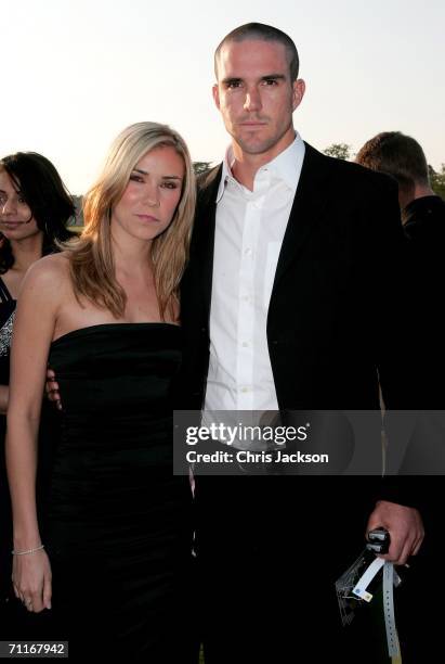 Kevin Pietersen and Jessica Taylor from Liberty X arrive at the Silverstone Grand Prix Ball on June 9, 2006 in Stowe, England