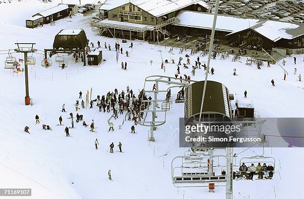 Skiers and snowboarders take to the slopes at Mt Hutt on the first day of the ski season June 10, 2006 in Methvan, New Zealand.
