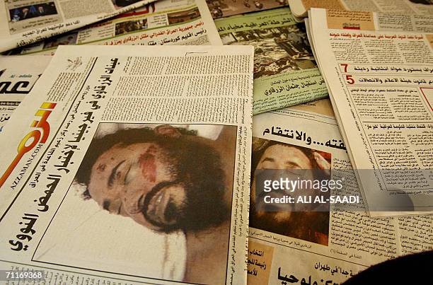 Pictures of dead al-Qaeda leader in Iraq Abu Musab al-Zarqawi are seen on the front pages of Iraqi newspapers 10 June 2006. Iraqi newspapers that...