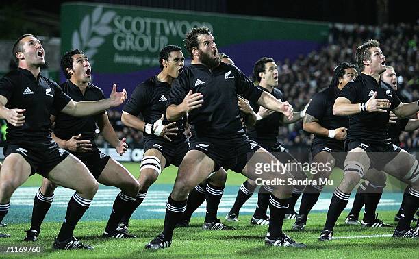 Aaron Mauger , Mils Muliaina, Carl Hayman and Richie McCaw of New Zealand perform the Haka before the international test match between the New...