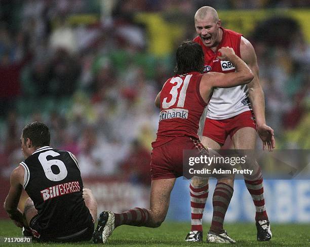 Barry Hall of the Swans celebrates with Brett Kirk during the round 11 AFL match between the Sydney Swans and the St Kilda Saints at the Sydney...