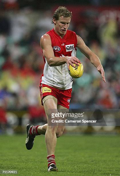 Craig Bolton of the Swans kicks the ball during the round 11 AFL match between the Sydney Swans and the St Kilda Saints at the Sydney Cricket Ground...