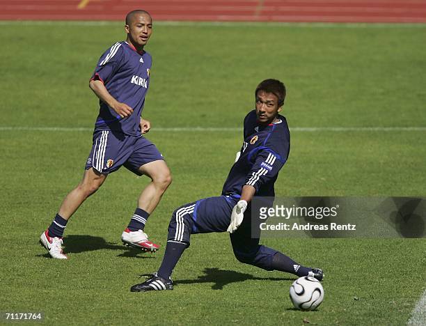 Shinji Ono in action with goalkeeper Yoichi Doi during the training session of Japan at Sportpark Nord on June 10, 2006 in Bonn, Germany.