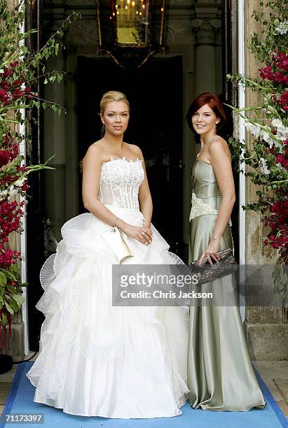 Former Russian president Mikhail Gorbachev's grand-daughters Ksenia and Anastasia Virganskaya pose for a photograph as they arrive for the Raisa...