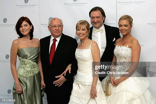 Former Russian president Mikhail Gorbachev poses with his grand-daugther Anastasia Virganskaya, daughter Irina Virganskaya , Andrei Trychachev and...