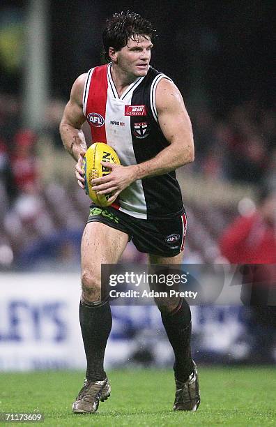 Robert Harvey of the Saints runs with the ball during the round 11 AFL match between the Sydney Swans and the St Kilda Saints at the Sydney Cricket...