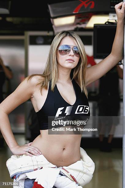 British model Keeley Hazell poses for the press with Midalnd F1 prior to the F1 British Grand Prix at Silverstone on June 11 in Silverstone, England.