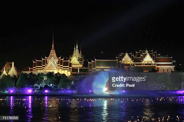 General view of the Chaophaya river lit by candles as part of a ceremony to pay tribute to Thailand's King Bhumibol Adulyadej on June 9, 2006 in...