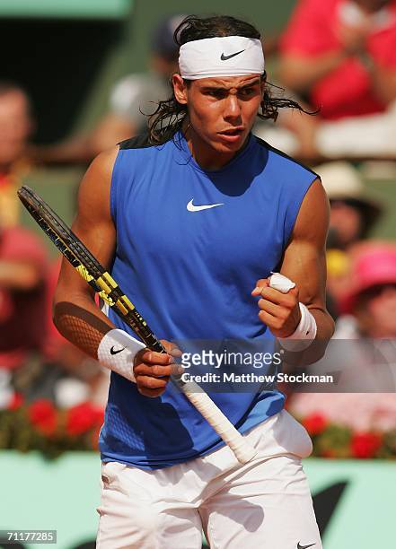 Rafael Nadal of Spain celebrates a point against Roger Federer of Switzerland during the Men's Singles Final on day fifteen of the French Open at...