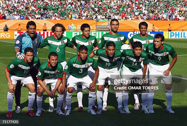 The Mexican team poses at Nuremberg's Franken Stadium ahead of the first round Group D World Cup football match between Mexico and Iran, 11 June...