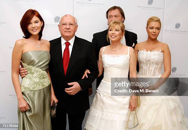 Former Russian president Mikhail Gorbachev poses with his grand-daughter Anastasia Virganskaya, daughter Irina Virganskaya and grand-daughter Ksenia...