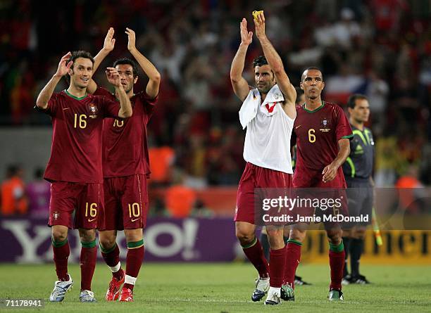 Ricardo Carvalho, Hugo Viana, Luis Figo and Costinha of Portugal acknowledge the fans after the FIFA World Cup Germany 2006 Group D match between...