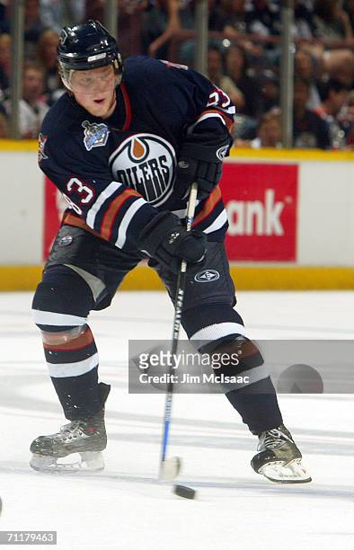 Ales Hemsky of the Edmonton Oilers controls the puck against the Carolina Hurricanes during game three of the 2006 NHL Stanley Cup Finals on June 10,...