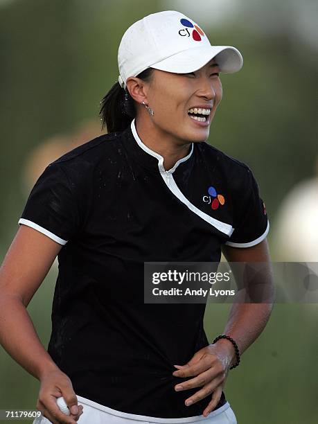 Se Ri Pak of South Korea reacts after being sprayed with champagne after winning the McDonald's LPGA Championship on June 11, 2006 at Bulle Rock Golf...