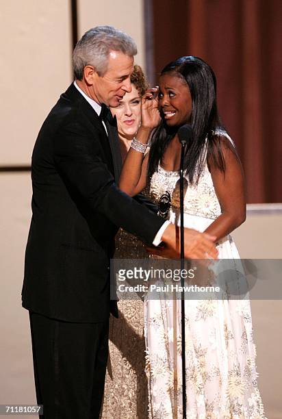 James Naughton and Bernadette Peters present actress LaChanze with the "Best Performance by a Leading Actress in a Musical" award for "The Color...