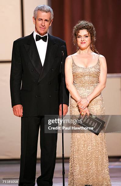 Presenters James Naughton and Bernadette Peters appear onstage at the 60th Annual Tony Awards at Radio City Music Hall June 11, 2006 in New York City.