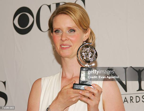 Actress Cynthia Nixon poses backstage with the "Best Performance By a Leading Actress in a Play" award at the 60th Annual Tony Awards at Radio City...