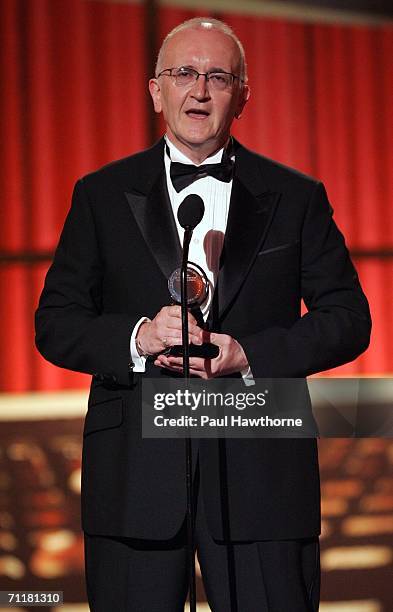 John Doyle accepts the "Best Direction of a Musical" award for Sweeny Todd onstage at the 60th Annual Tony Awards at Radio City Music Hall June 11,...