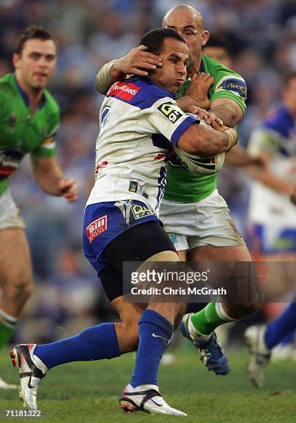 Hazem El Masri of the Bulldogs makes a break during the round 14 NRL match between the Bulldogs and the Canberra Raiders played at Telstra Stadium,...