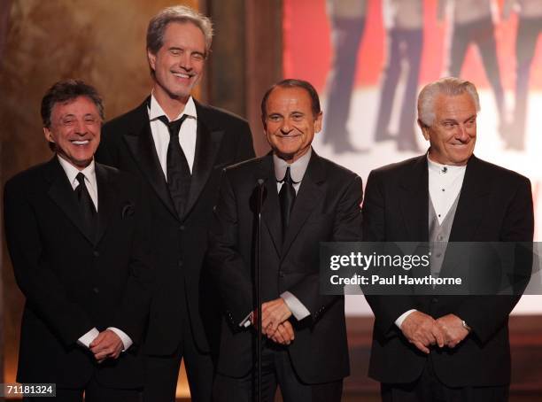 Actor Joe Pesci stands onstage with Frankie Valli and the original Four Seasons onstage at the 60th Annual Tony Awards at Radio City Music Hall June...
