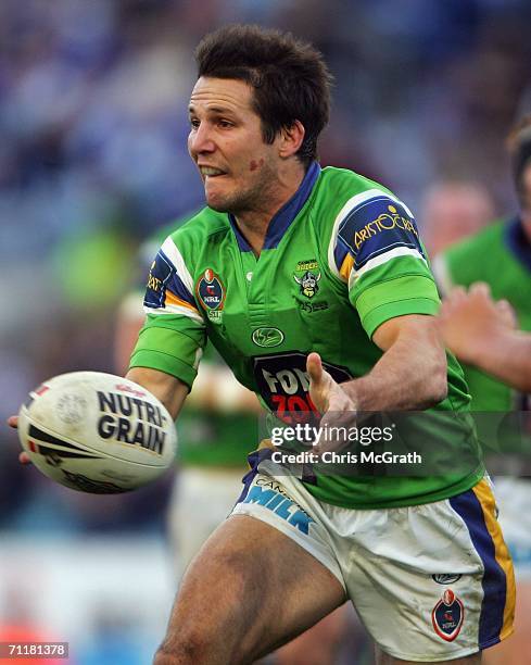 Clinton Schifcofske of the Raiders throws a pass during the round 14 NRL match between the Bulldogs and the Canberra Raiders played at Telstra...