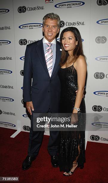 Michael Buffer and Christine Prado arrives at the Cedars-Sinai Medical Center's 21st Annual Sports Spectacular at the Hyatt Regency Century Plaza...