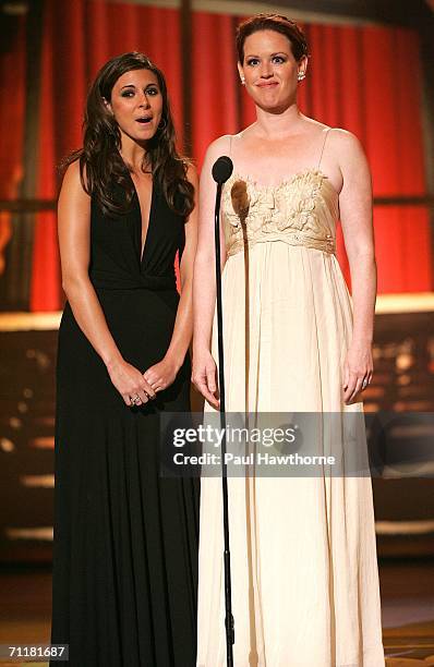 Presenters Jamie-Lynn Sigler and Molly Ringwald appear onstage at the 60th Annual Tony Awards at Radio City Music Hall June 11, 2006 in New York City.