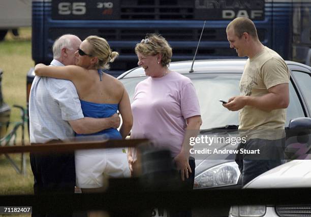 Zara Phillips with boyfriend Mike Tindall say their farewells to a couple at the close of the U25's Show Jumping final competition round of the...