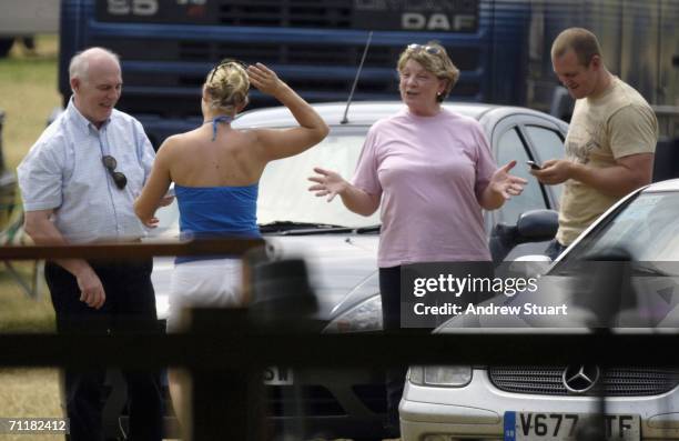 Zara Phillips with boyfriend Mike Tindall say their farewells to a couple at the close of the U25's Show Jumping final competition round of the...