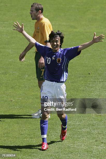 Shunsuke Nakamura of Japan celebrates after scoring the opening goal during the FIFA World Cup Germany 2006 Group F match between Australia and Japan...