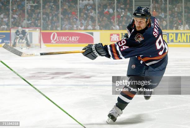 Ryan Smyth of the Edmonton Oilers takes a slapshot against the Carolina Hurricanes during game three of the 2006 NHL Stanley Cup Finals on June 10,...